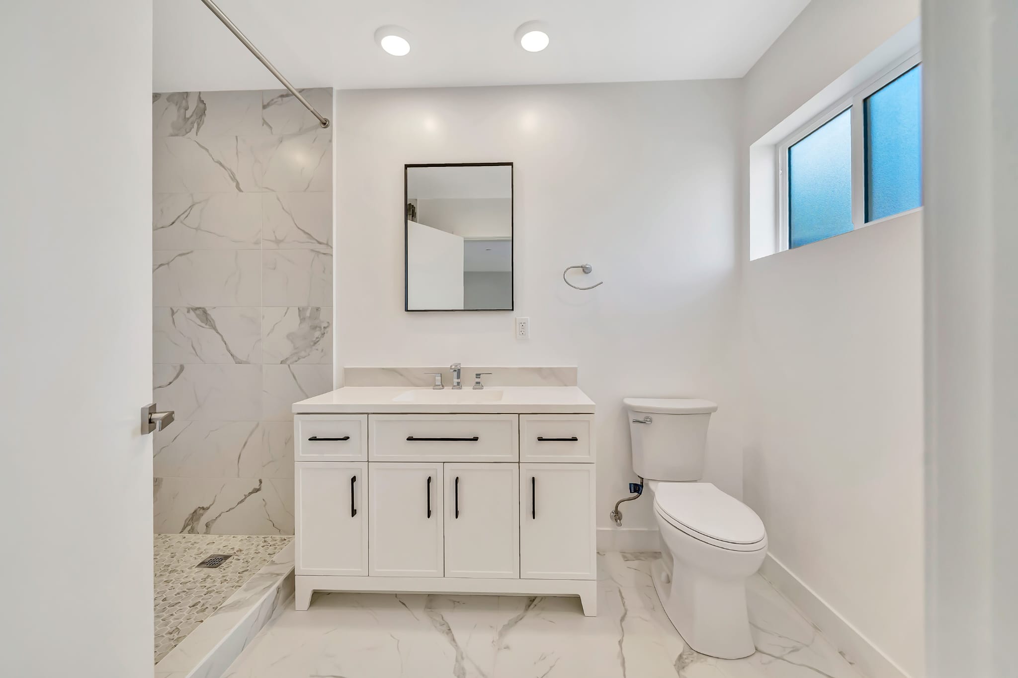 Bedroom with gray headboard